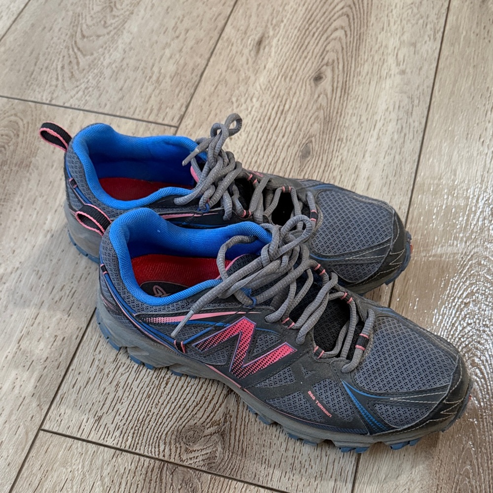 New Balance Gray Athletic Shoes with Pink and Blue Accents